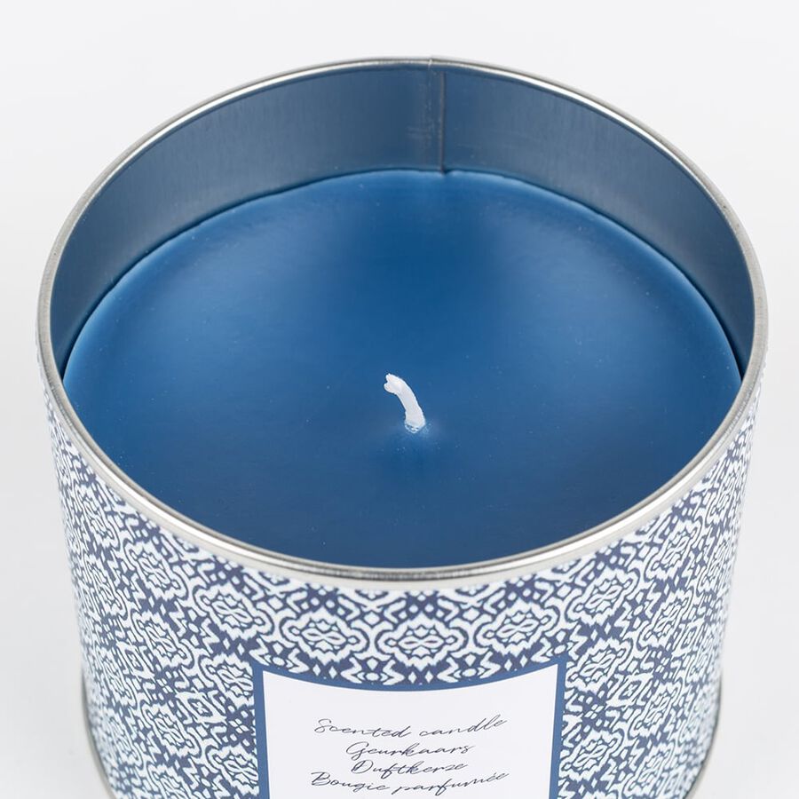 Vela con vaso de cristal aromática