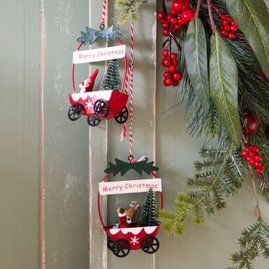 Figura decorativa carroza Navidad 10cm en varios modelos