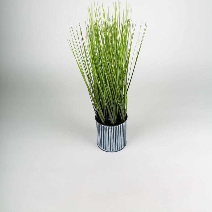 Planta artificial grande con maceta