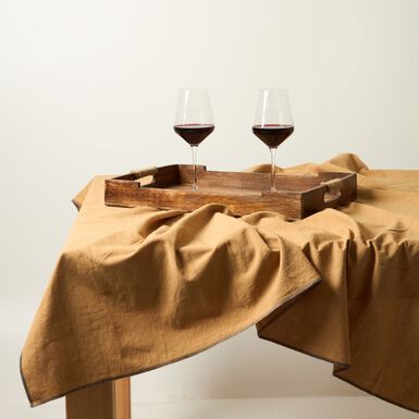 Mantel de algodón con flecos mostaza disponible en varias medidas