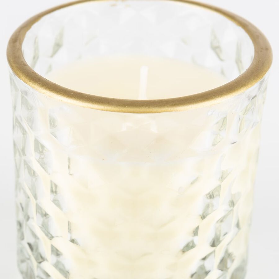 Vela perfumada con vaso de cristal dorado