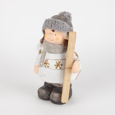 Figura decorativa de cerámica Niña con gorro y esquís 26cm