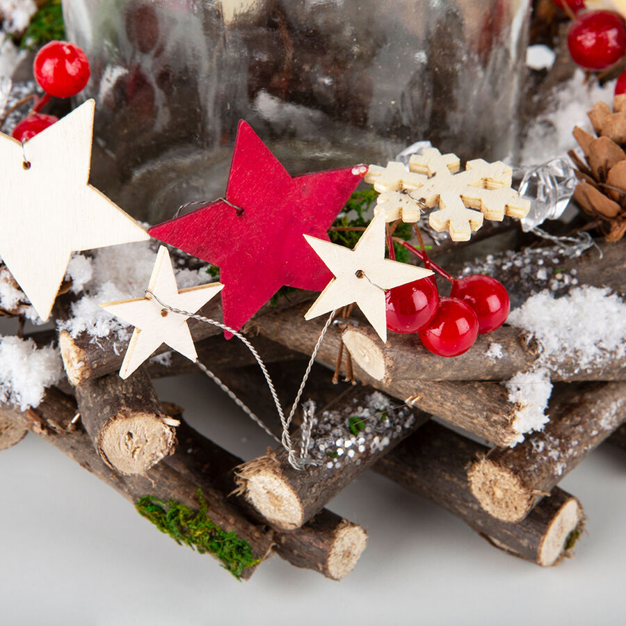 Centro portavela de estrellas y bayas