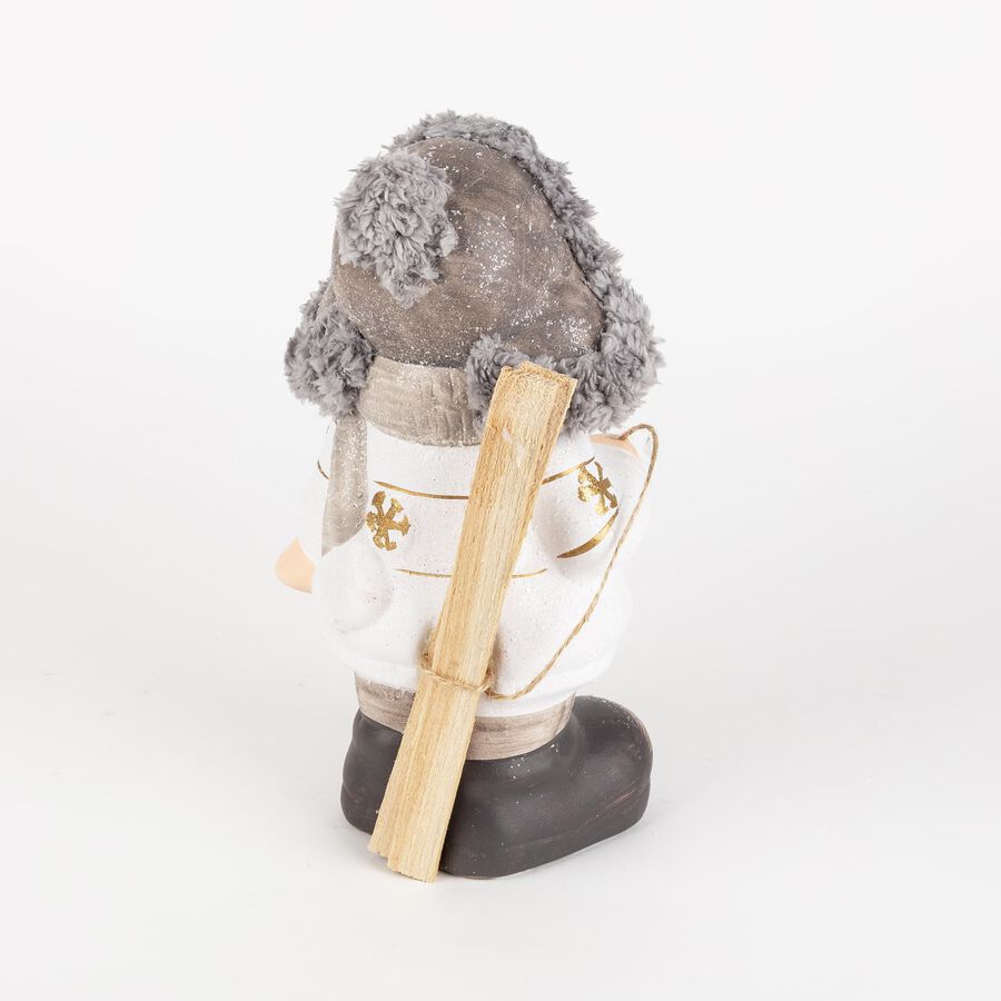 Ni&ntilde;o con gorro y esqu&iacute;s de cer&aacute;mica 26cm