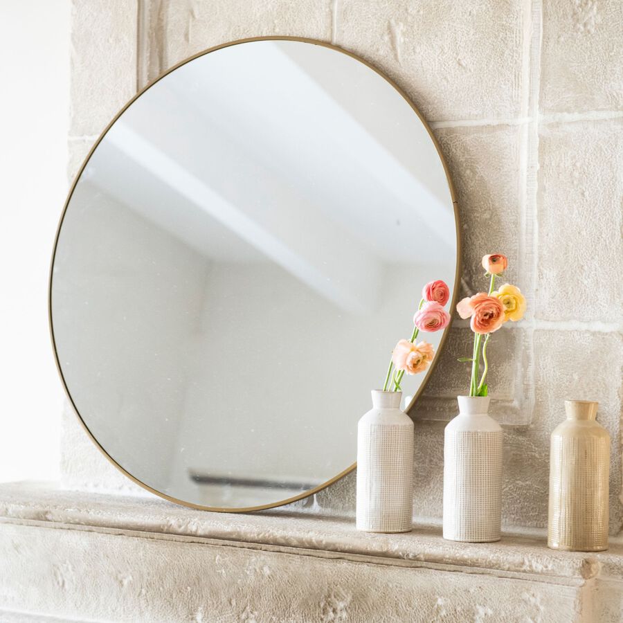 Espejo de pared redondo de metal dorado Orión Ø76cm