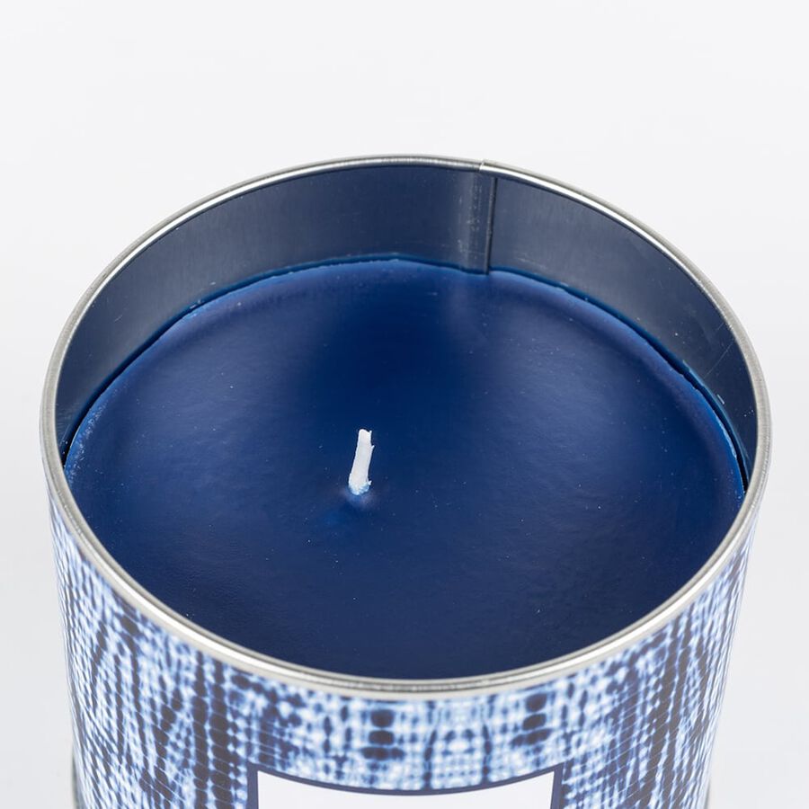 Vela con vaso de cristal aromática