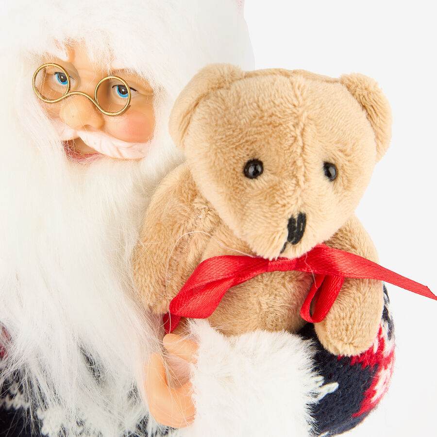 Figura decorativa Santa Claus con bolsa regalos y peluche 30cm