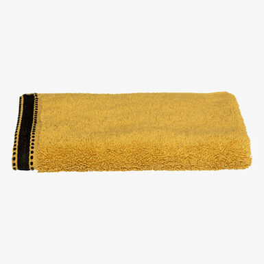 Toalla de tocador de algod&oacute;n mostaza Sena 30x50cm - 550 g/m&sup2;