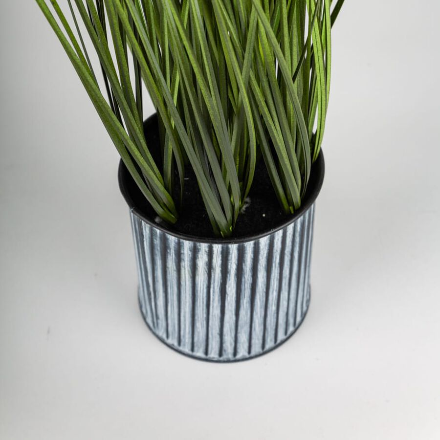 Planta artificial grande con maceta