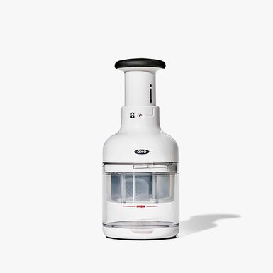 Picadora manual de verduras con prensa blanca - Oxo