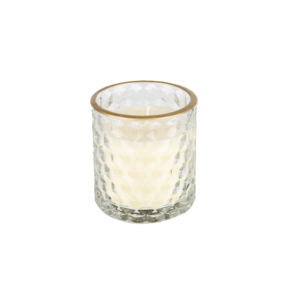 Vela perfumada con vaso de cristal dorado