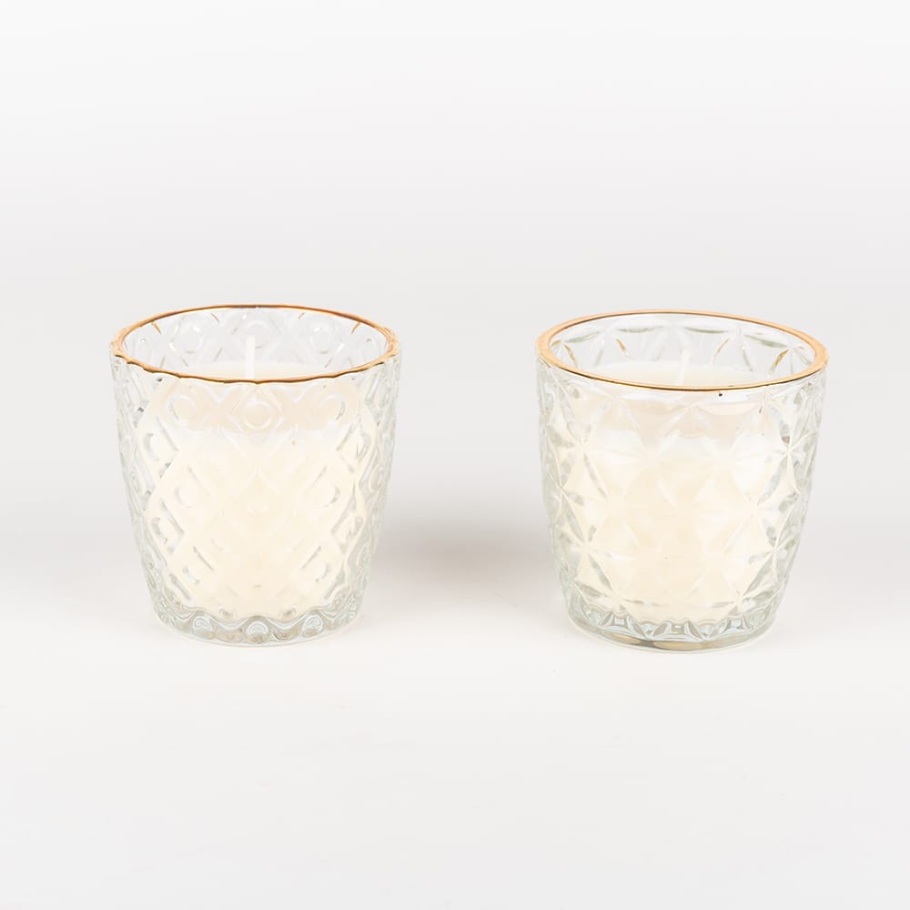 Vela en vaso de cristal transparente oro surtida 7x7cm