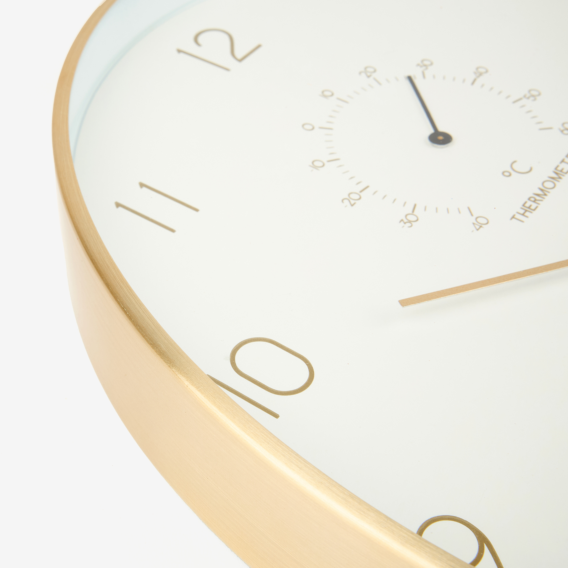 Reloj de pared ovalado dorado &Oslash;32x24cm