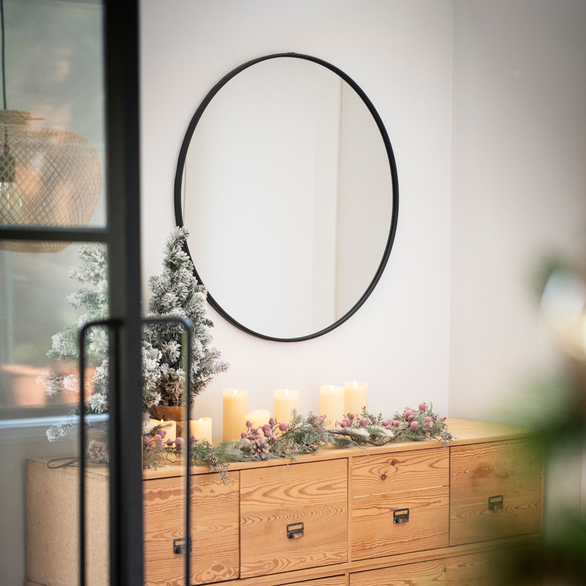 Espejo de pared redondo de metal negro Ø55cm