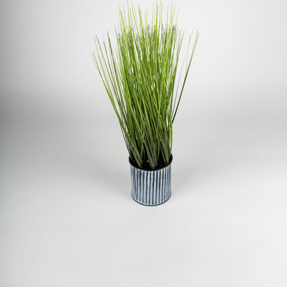 Planta artificial grande con maceta