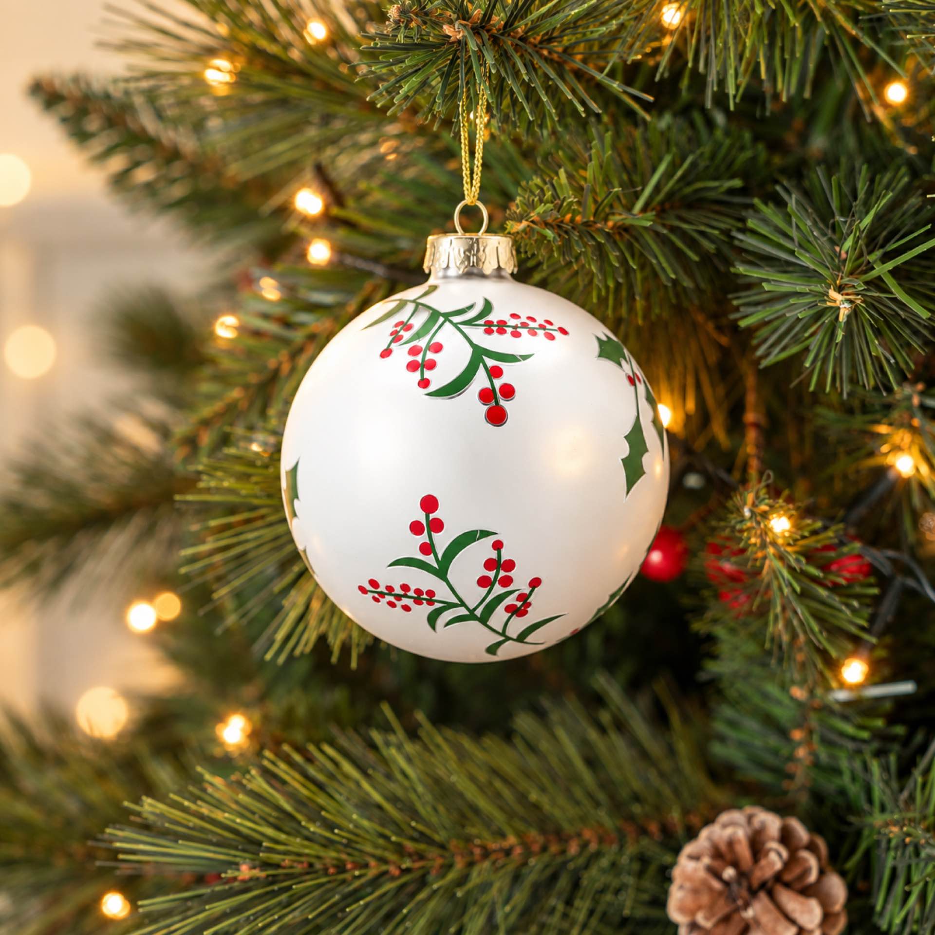 Bola de Navidad blanca de cristal con acebo &Oslash;8cm