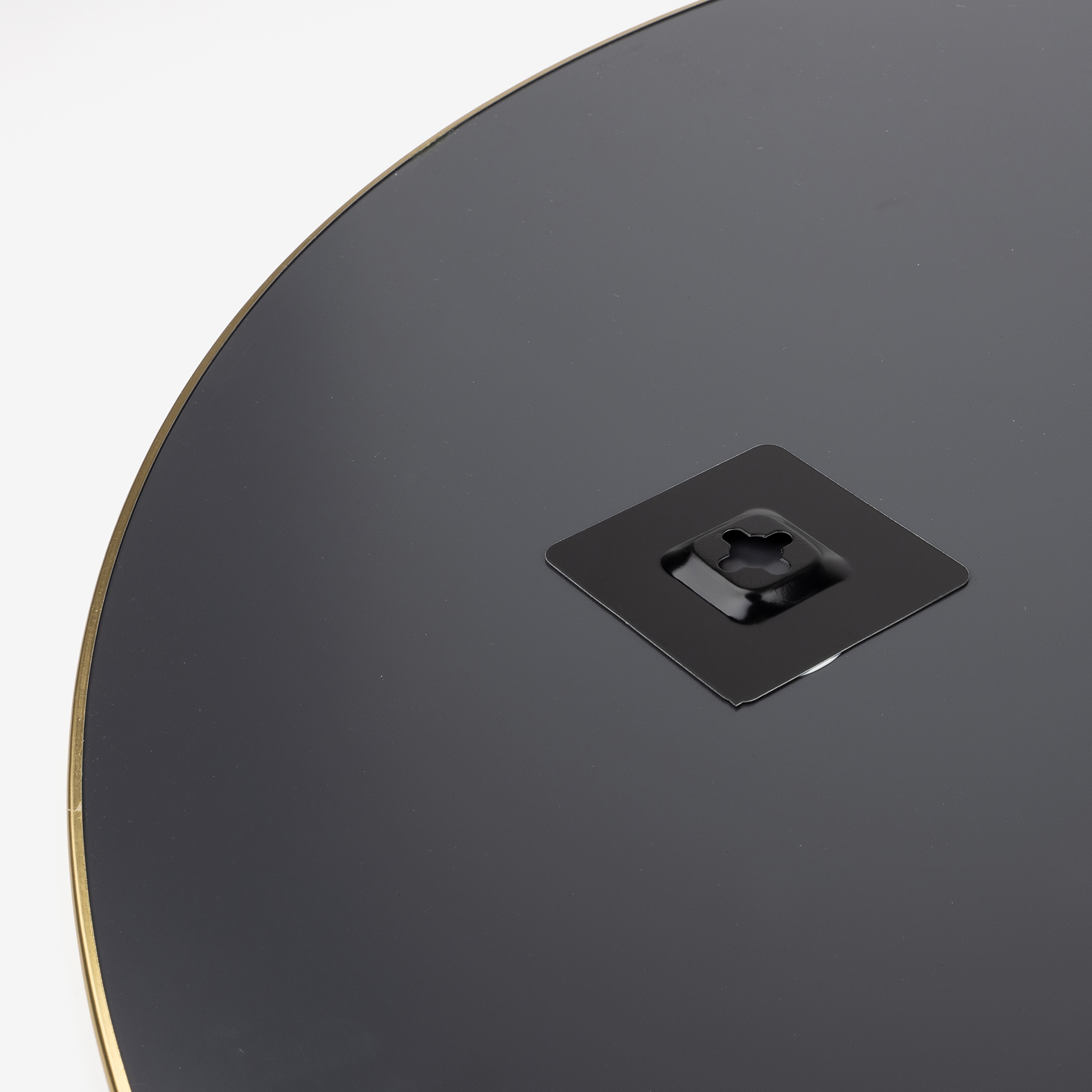 Espejo de pared redondo de metal dorado Orión Ø76cm