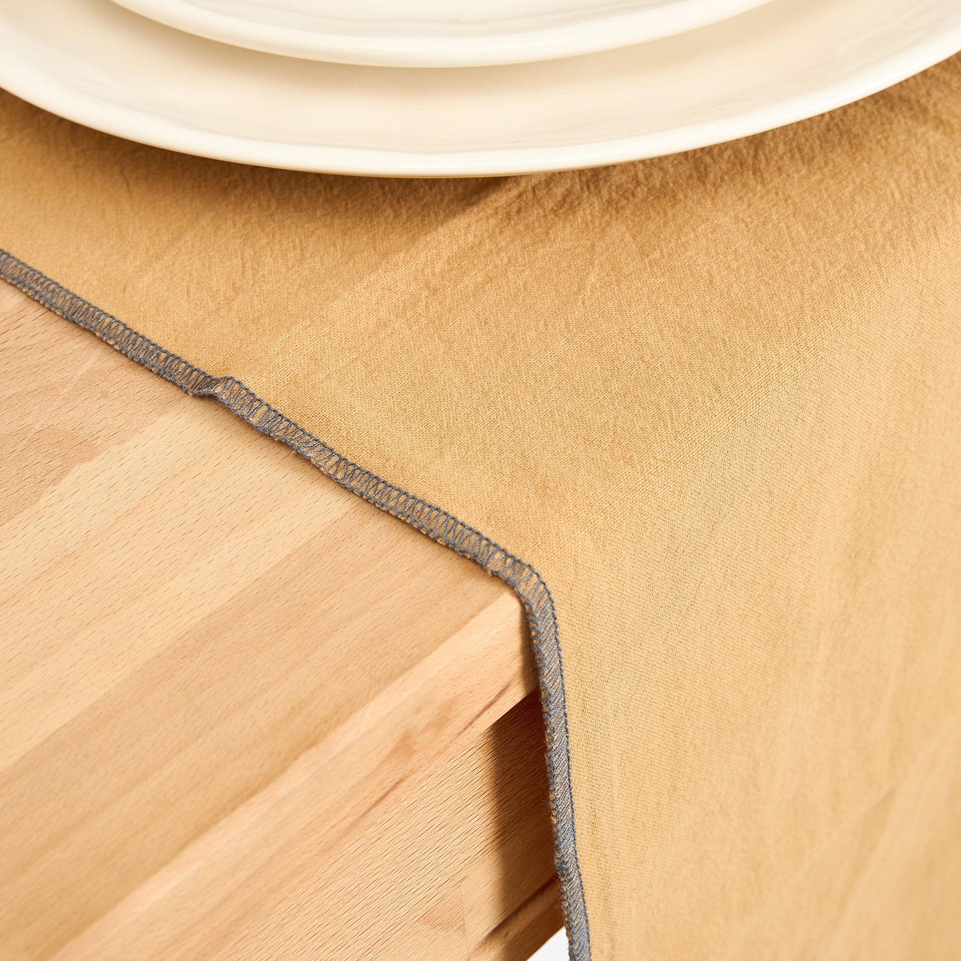 Camino de mesa de algodón con flecos mostaza 30x150cm