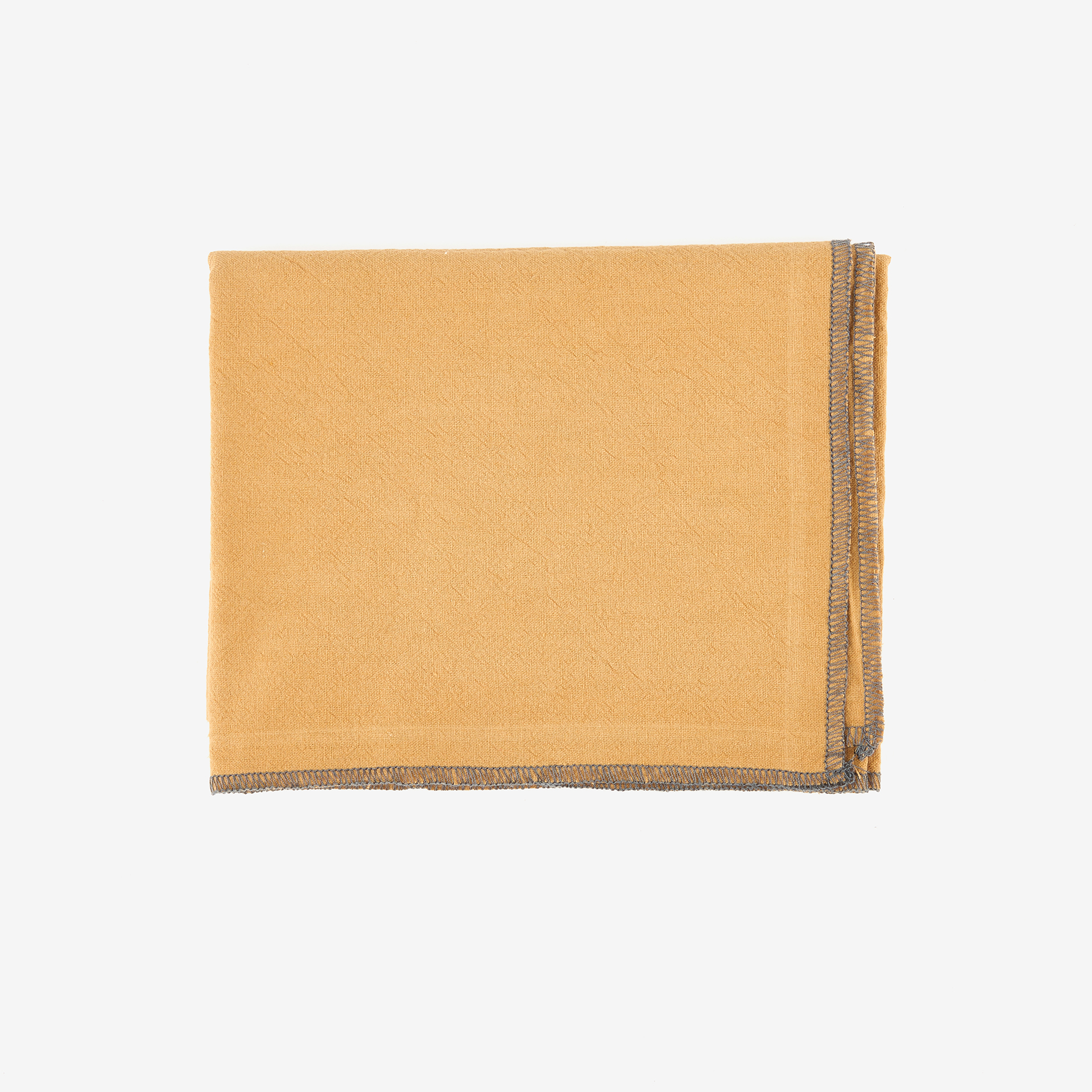 Camino de mesa de algodón con flecos mostaza 30x150cm