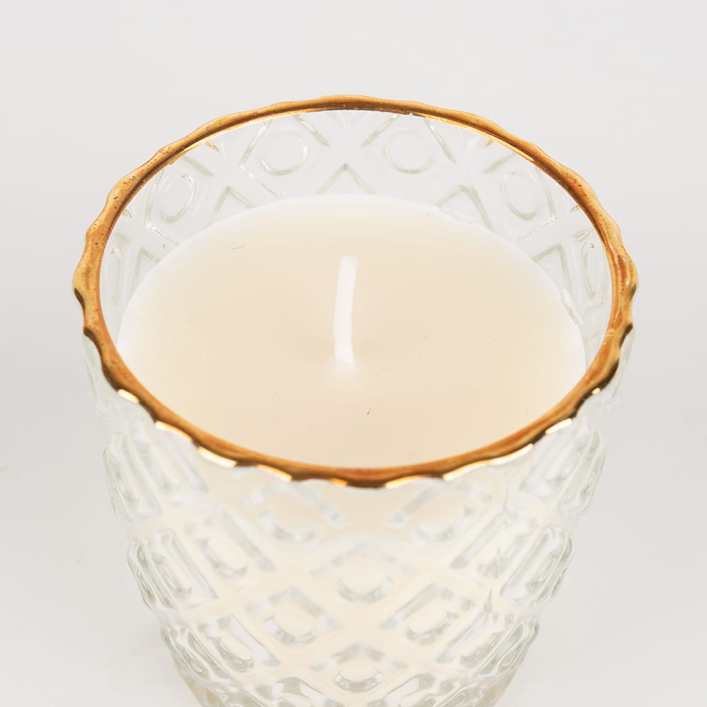 Vela en vaso de cristal transparente oro surtida 7x7cm