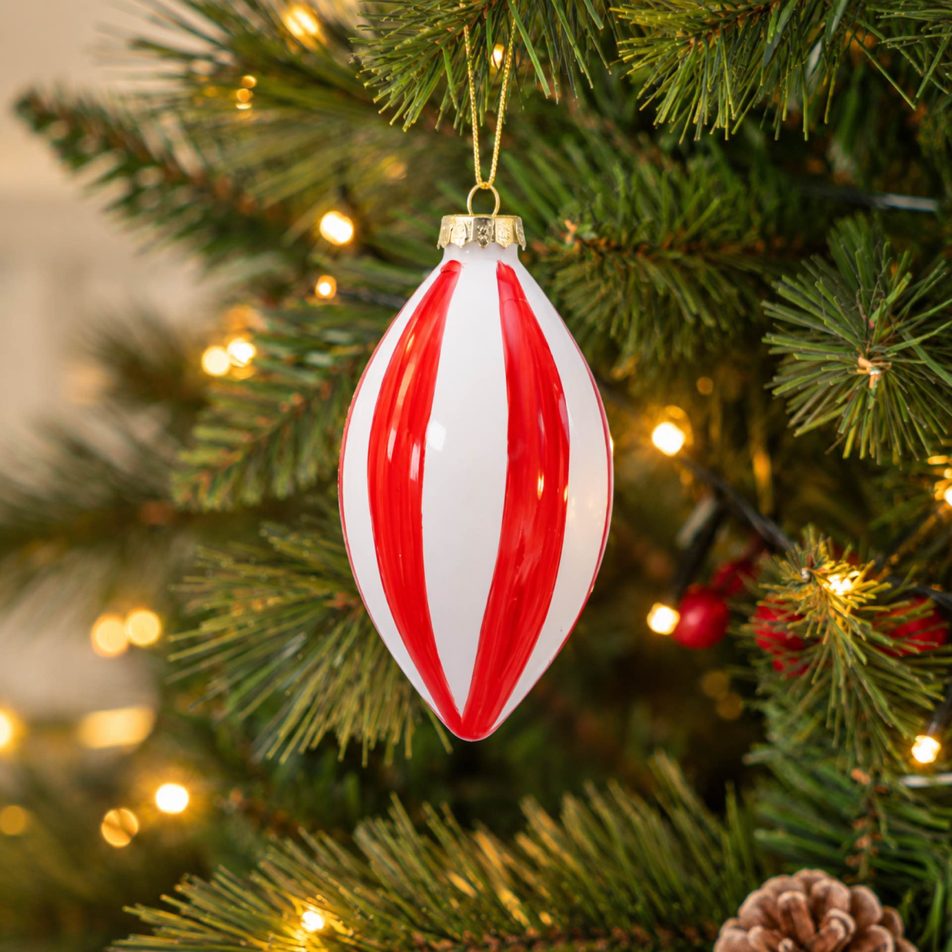 Bola de Navidad de l&aacute;grima roja y blanca de cristal 10cm