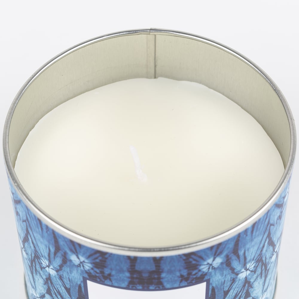 Vela con vaso de cristal aromática