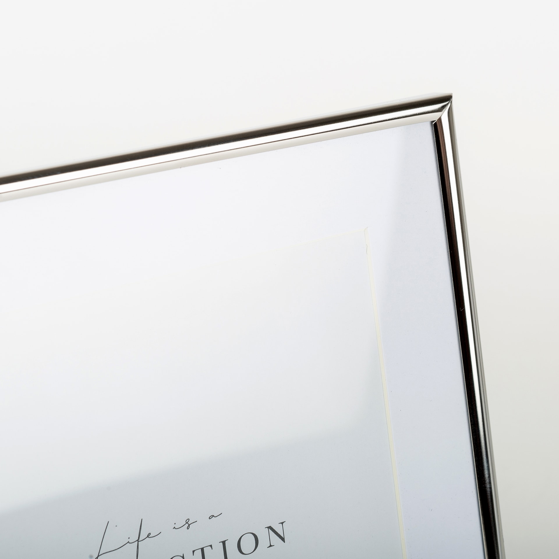 Marco de fotos de metal plateado Kilim 15x20cm