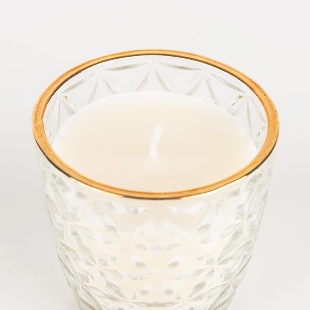 Vela en vaso de cristal transparente oro surtida 7x7cm