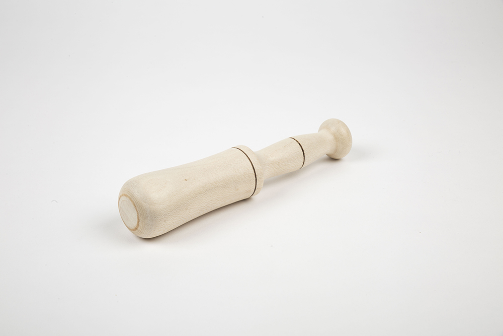 Mano de mortero de madera